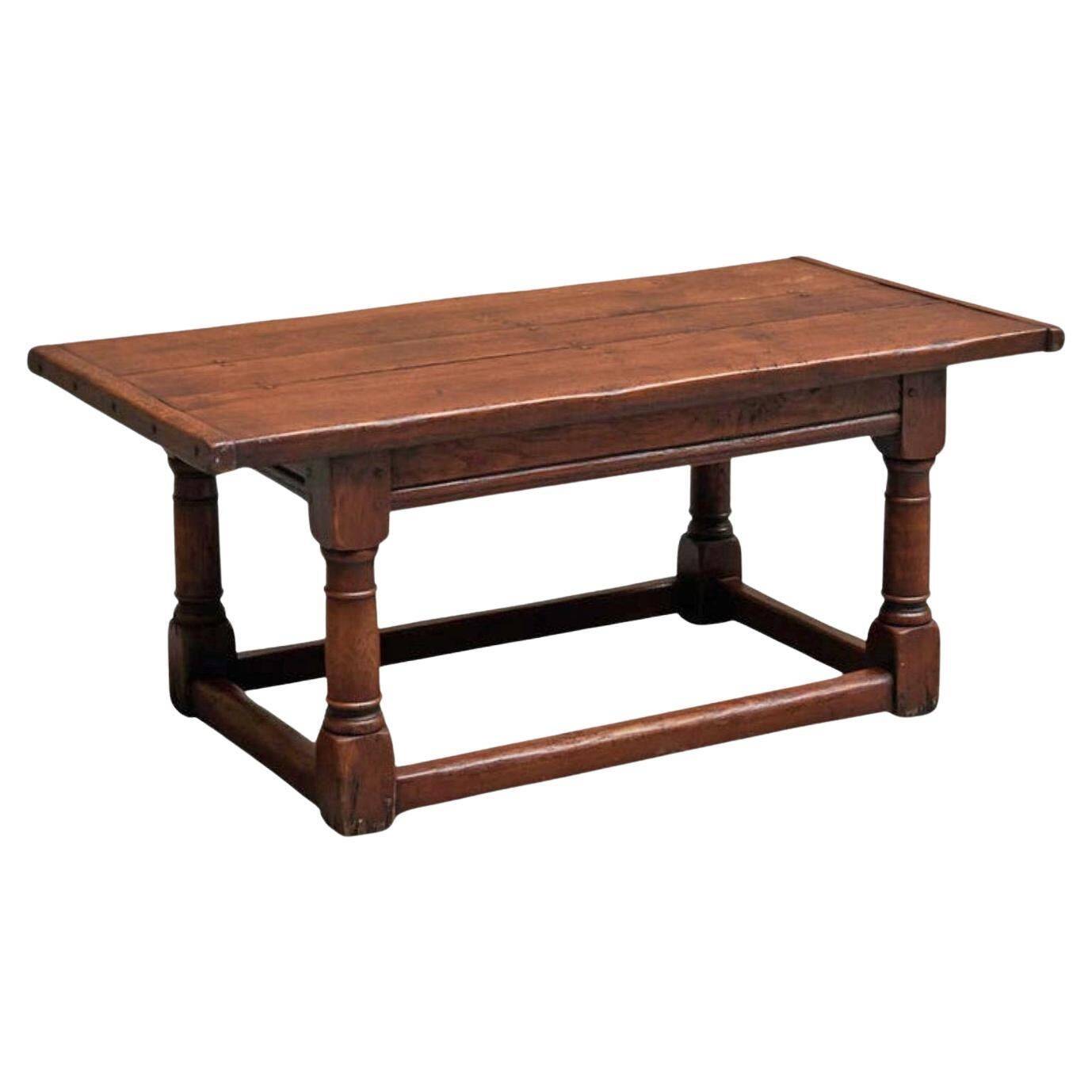 Antique solid oak coffee table in refectory style, 19th century.