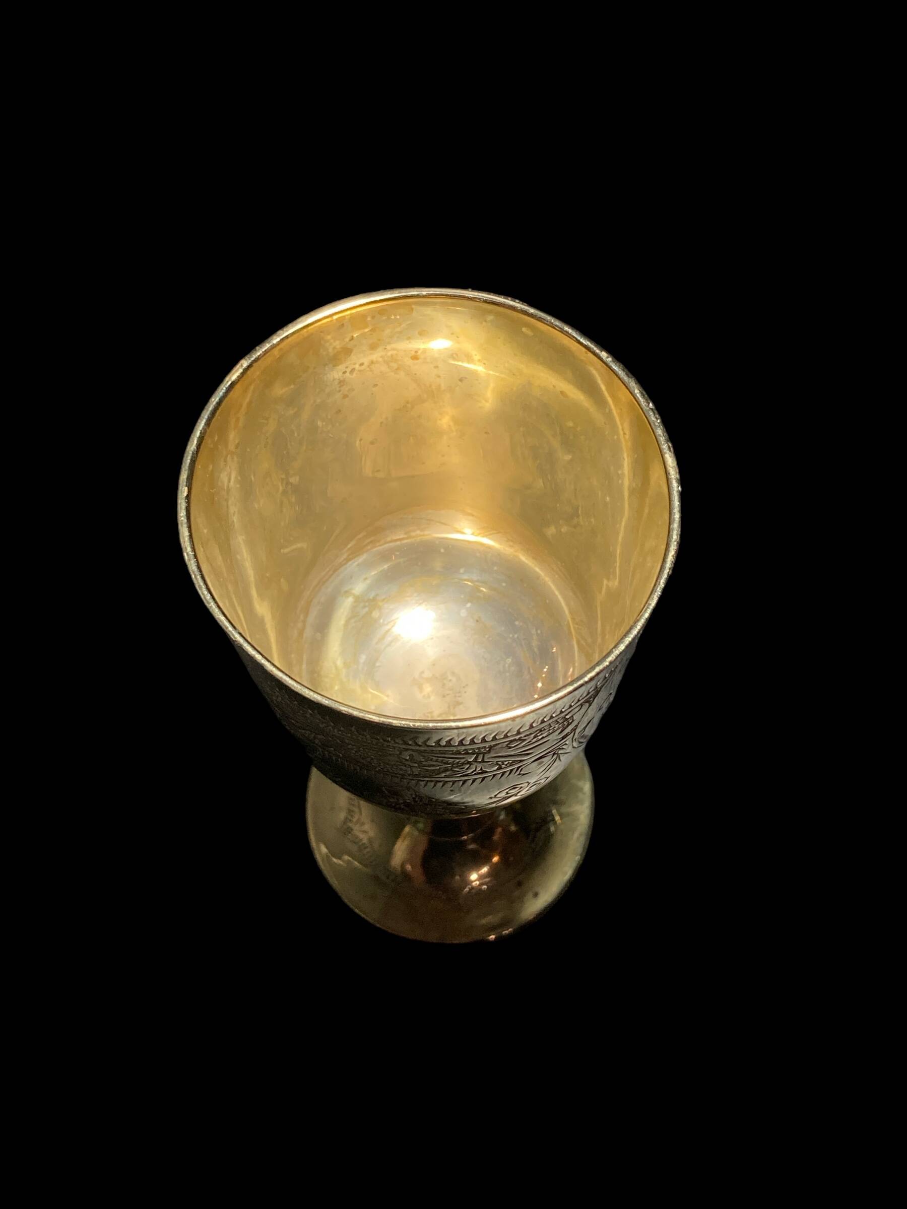 Set of six gold metal glasses