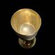 Set of six gold metal glasses