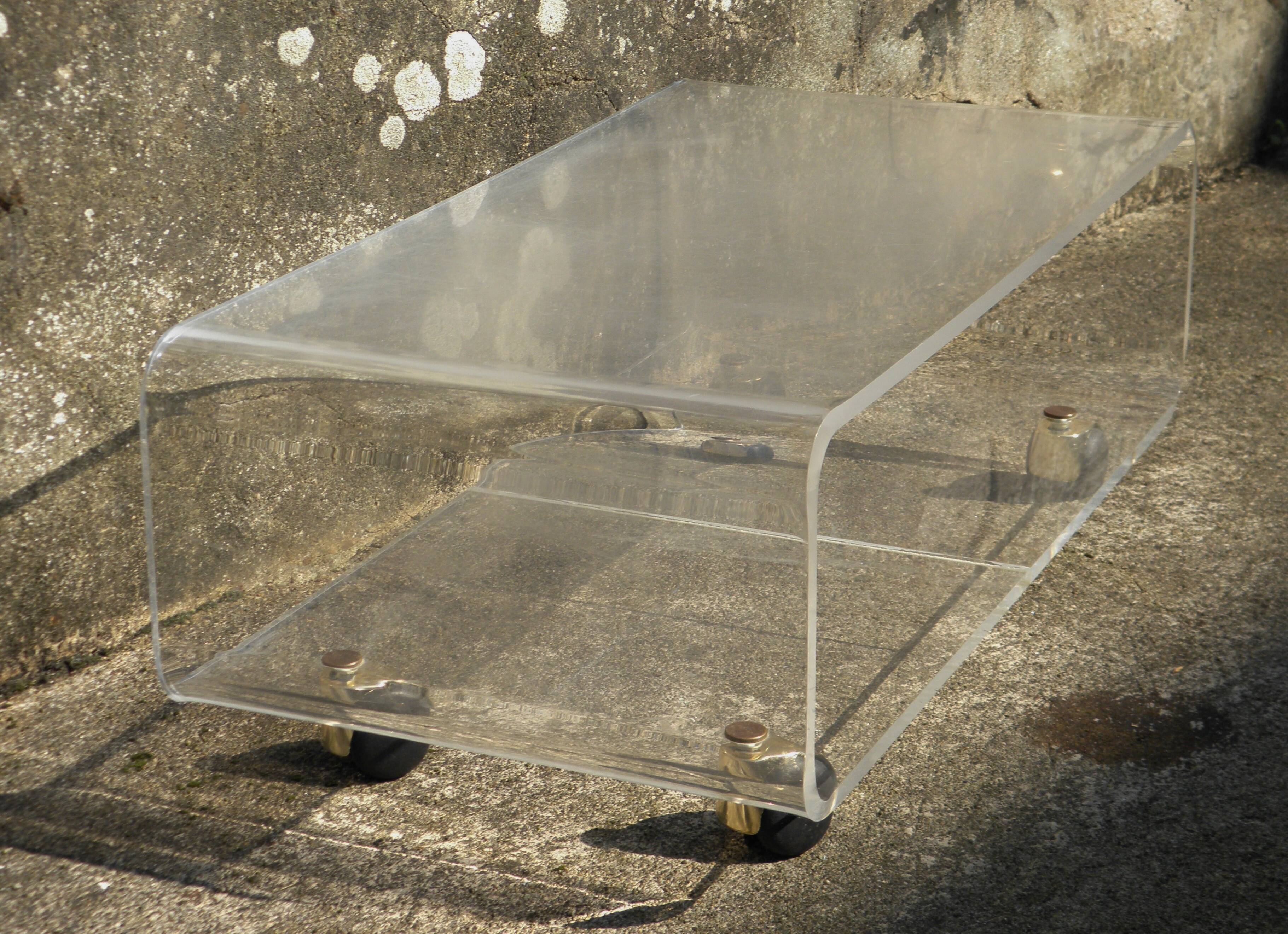 Plexiglass coffee table on wheels