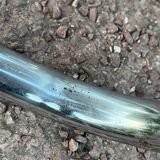 Wooden chair with caning in the style of Marcel Breuer.