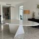 Elliptical table in Carrara marble and Corian attributed to Xavier Lust.