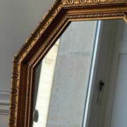 Miroir octogonal doré aux reflets cuivré