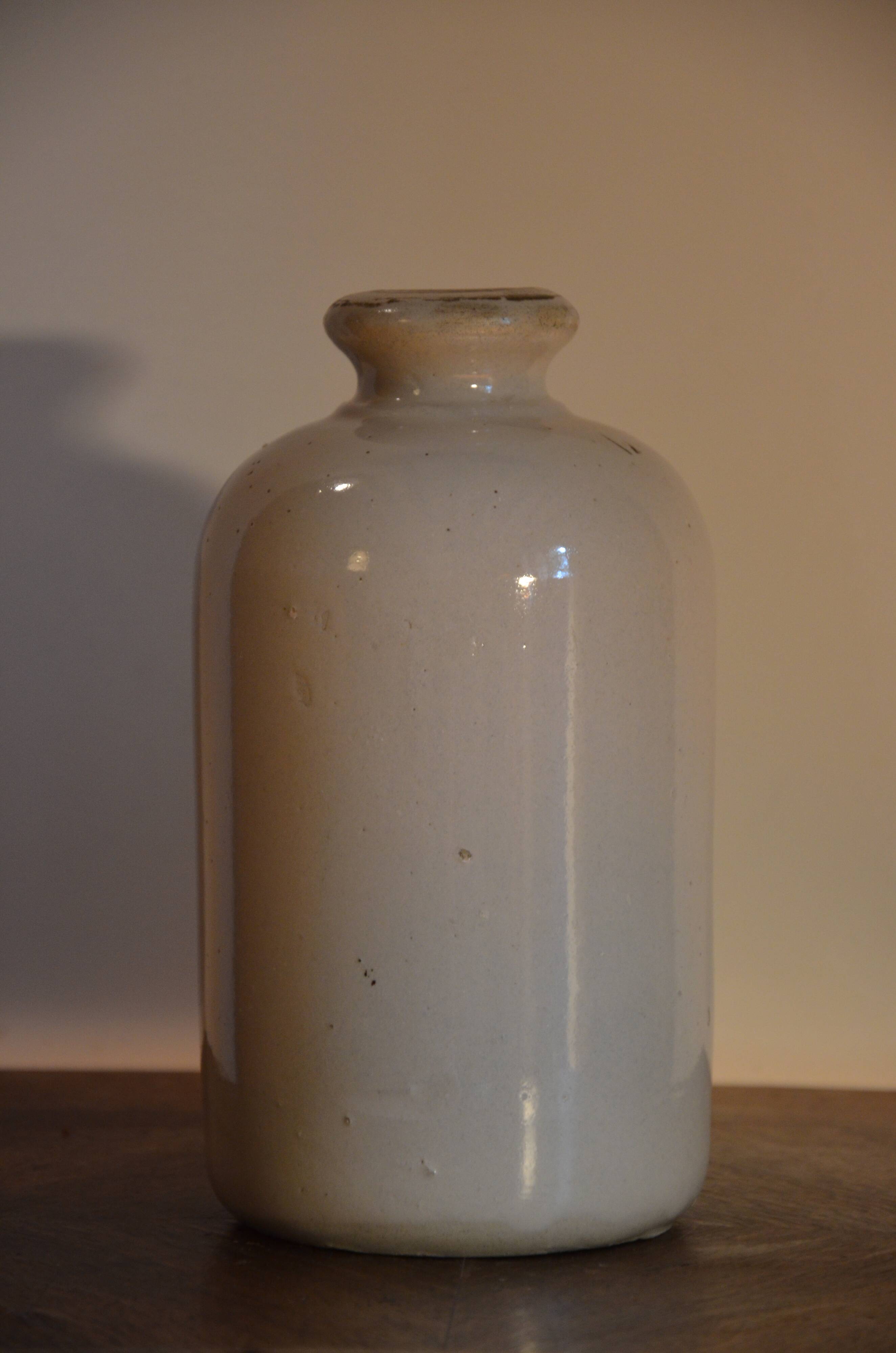 Off-white ceramic soliflore bottle