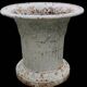 Series of 4 old cast iron vases