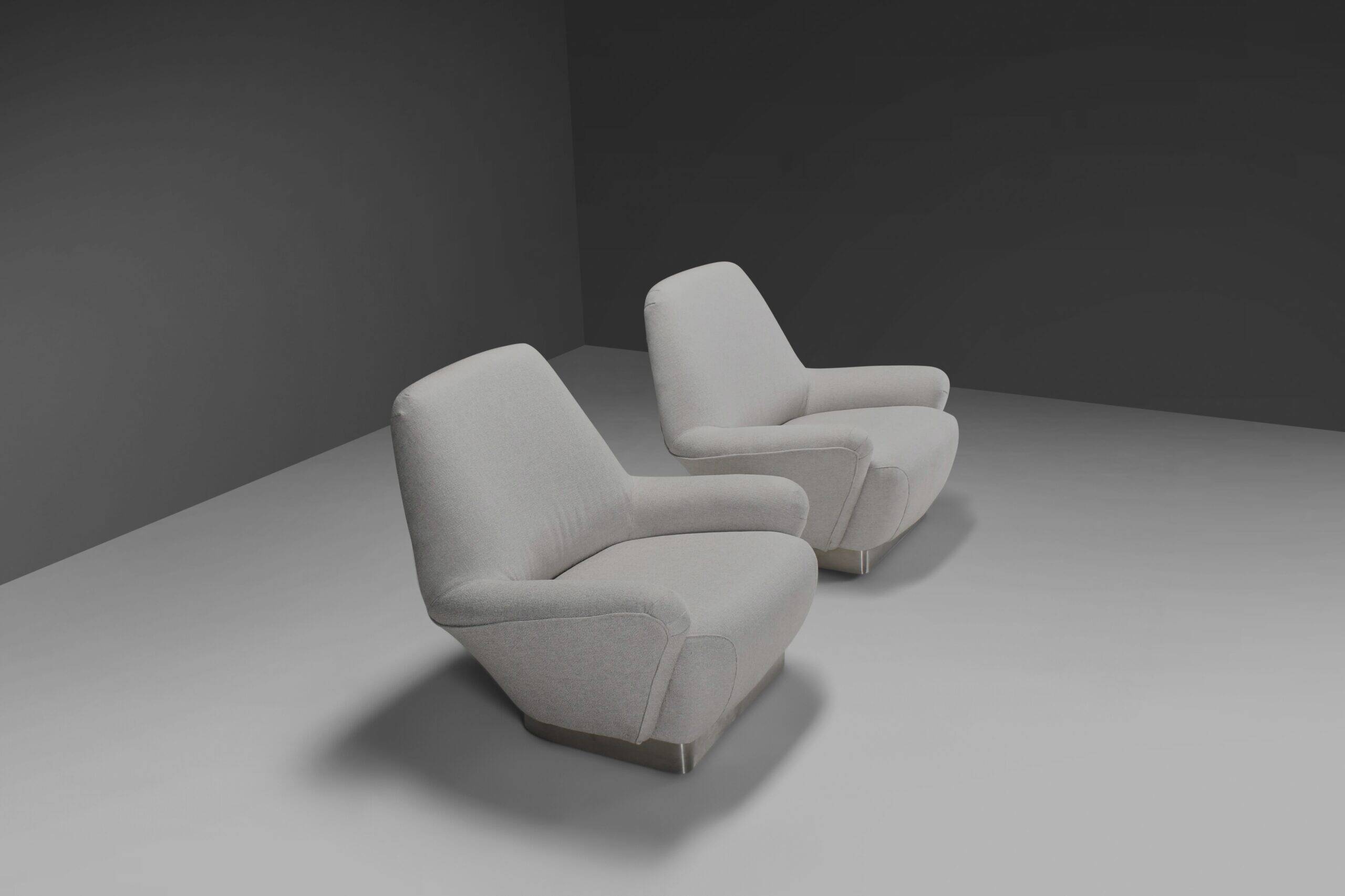 Pair of fabric and stainless steel lounge chairs by Gianni Moscatelli