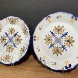 Pair of Nevers earthenware plates signed Georges