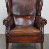 Large Sheepskin Leather Wingback Armchair with a Fixed Seat Cushion and a Stunning Patina