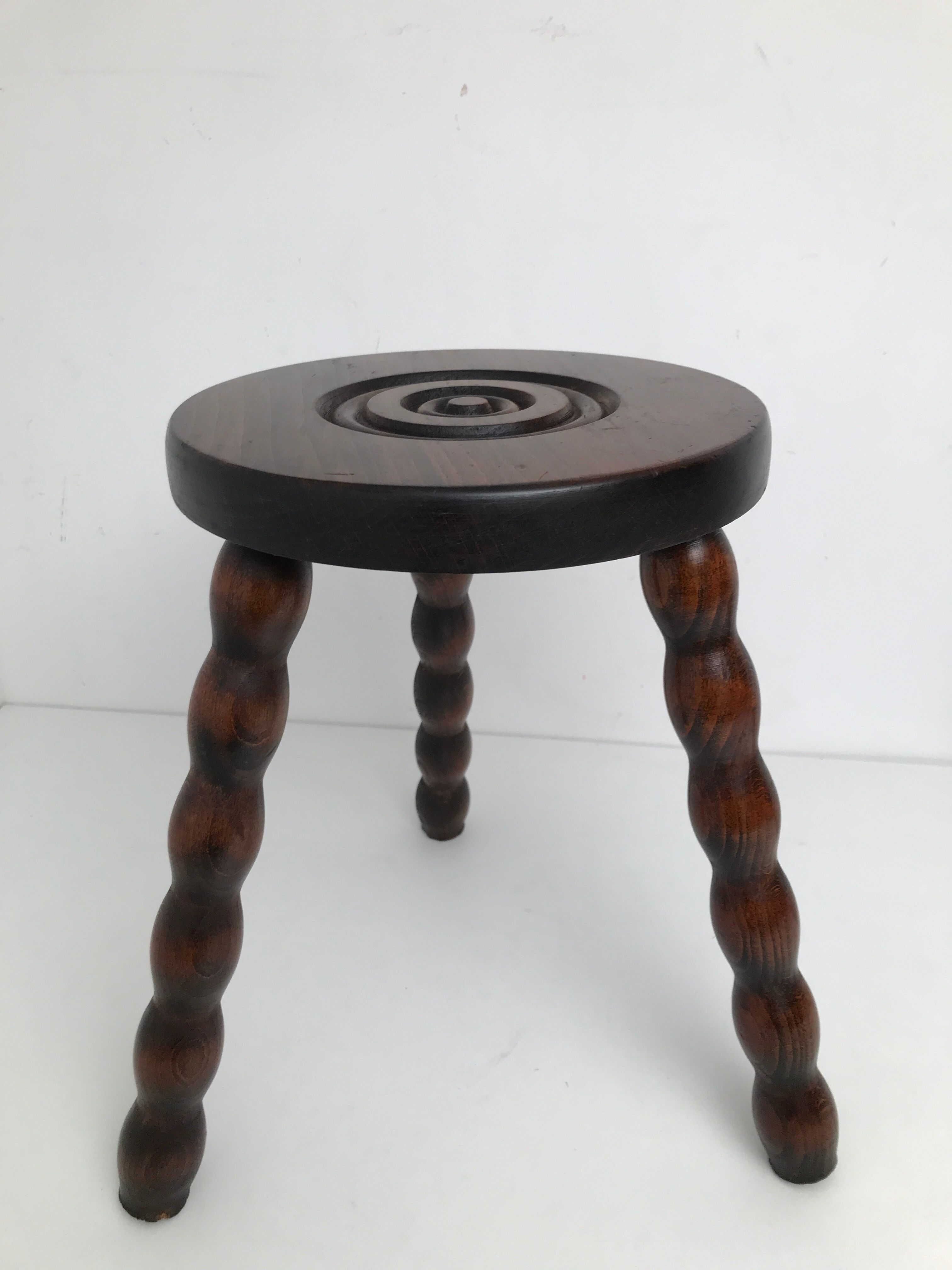 Wooden stool turned tripod foot