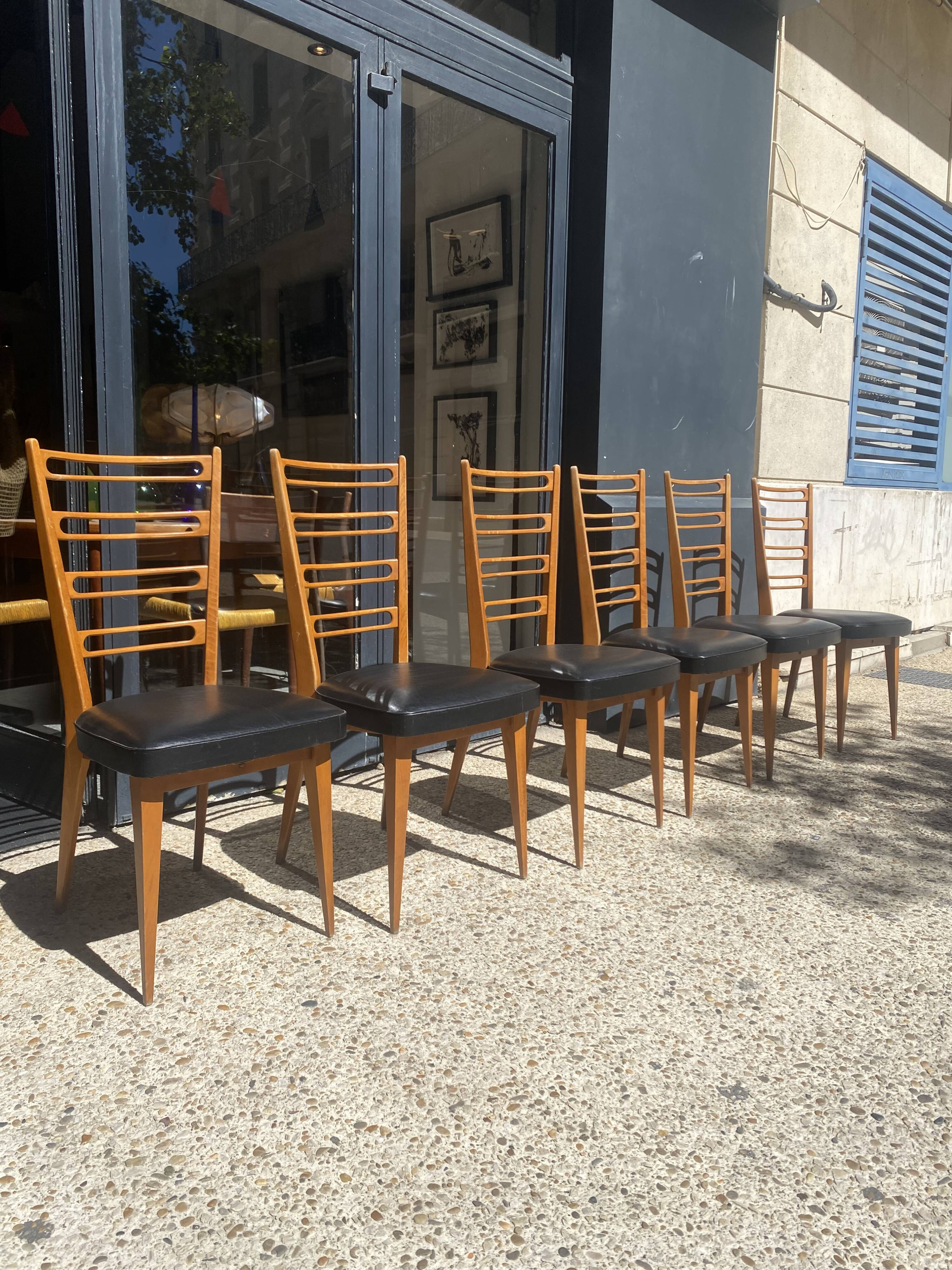 6 chaises bois et skaï noir années 60
