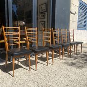 6 chaises bois et skaï noir années 60