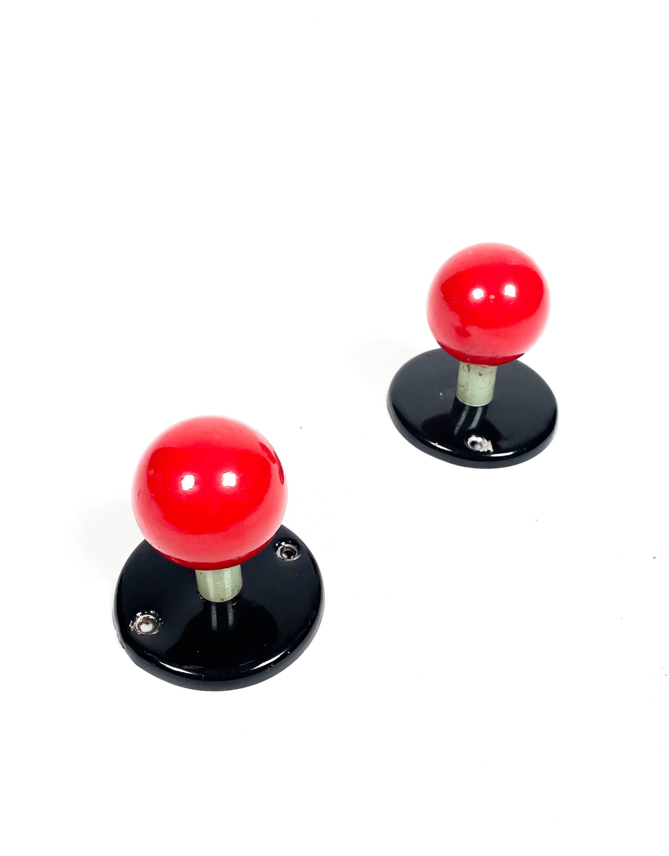 Vintage red enamel metal coat hooks