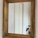 Antique giltwood wall mirror in gold