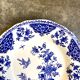 Round and hollow gien dish in white and blue enamelled earthenware