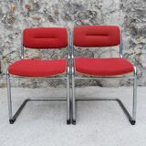Red chairs cantilever chrome tubes