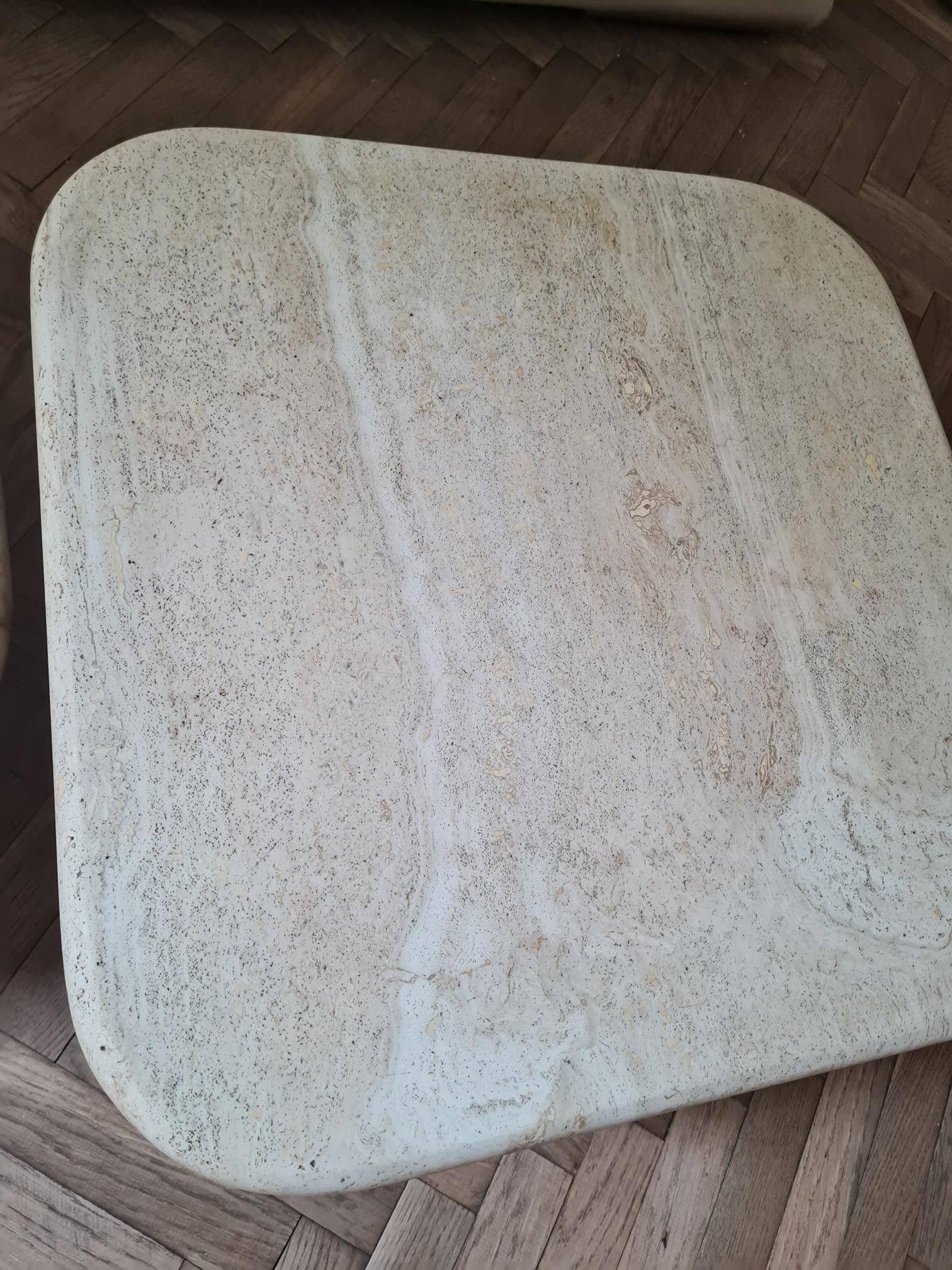 Pair of travertine nesting tables