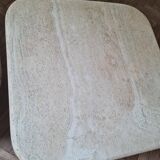Pair of travertine nesting tables