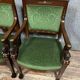 Pair of Empire-Consulate armchairs in molded and carved mahogany