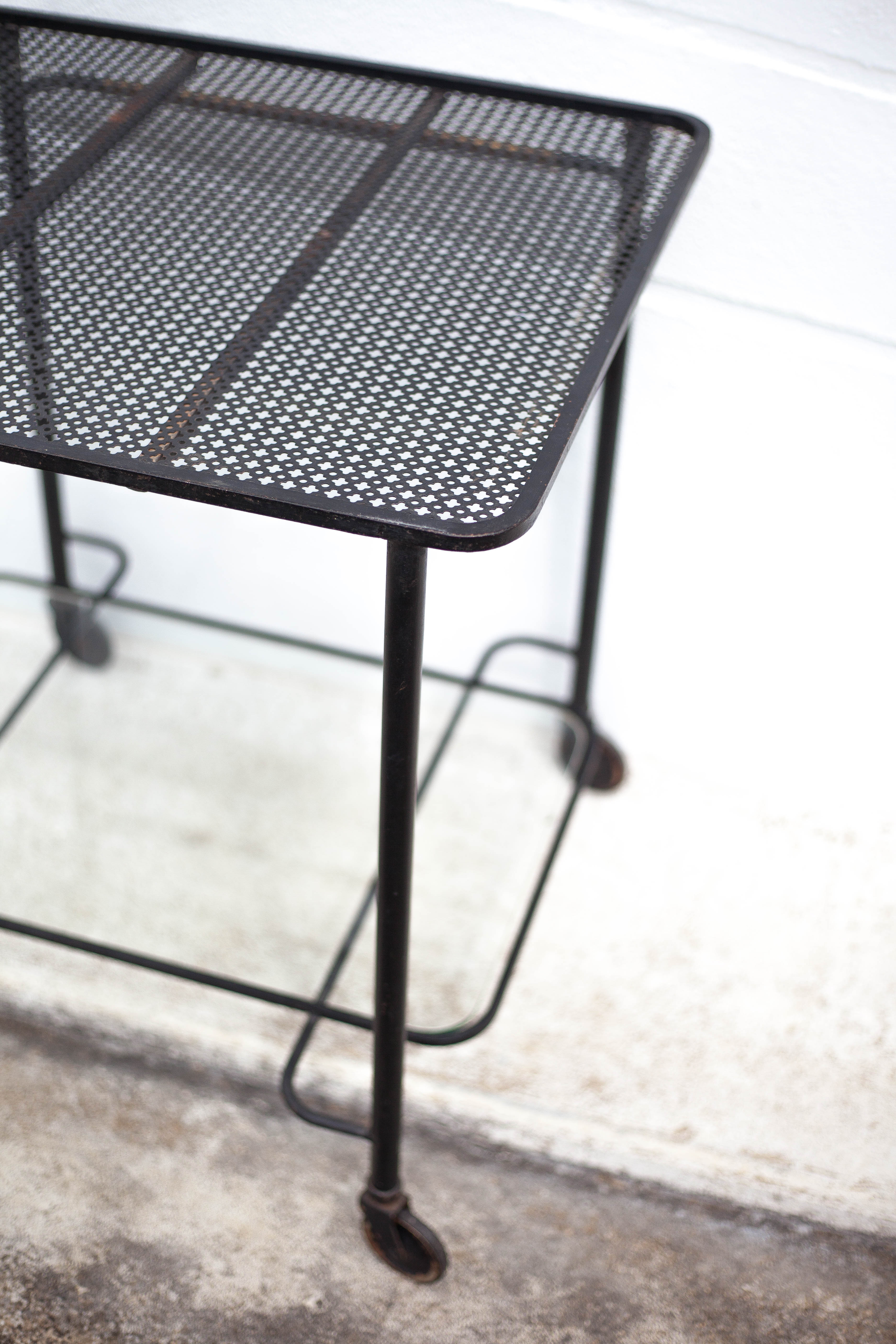 Mathieu Matégot rolling table, steel and brass service, 50s