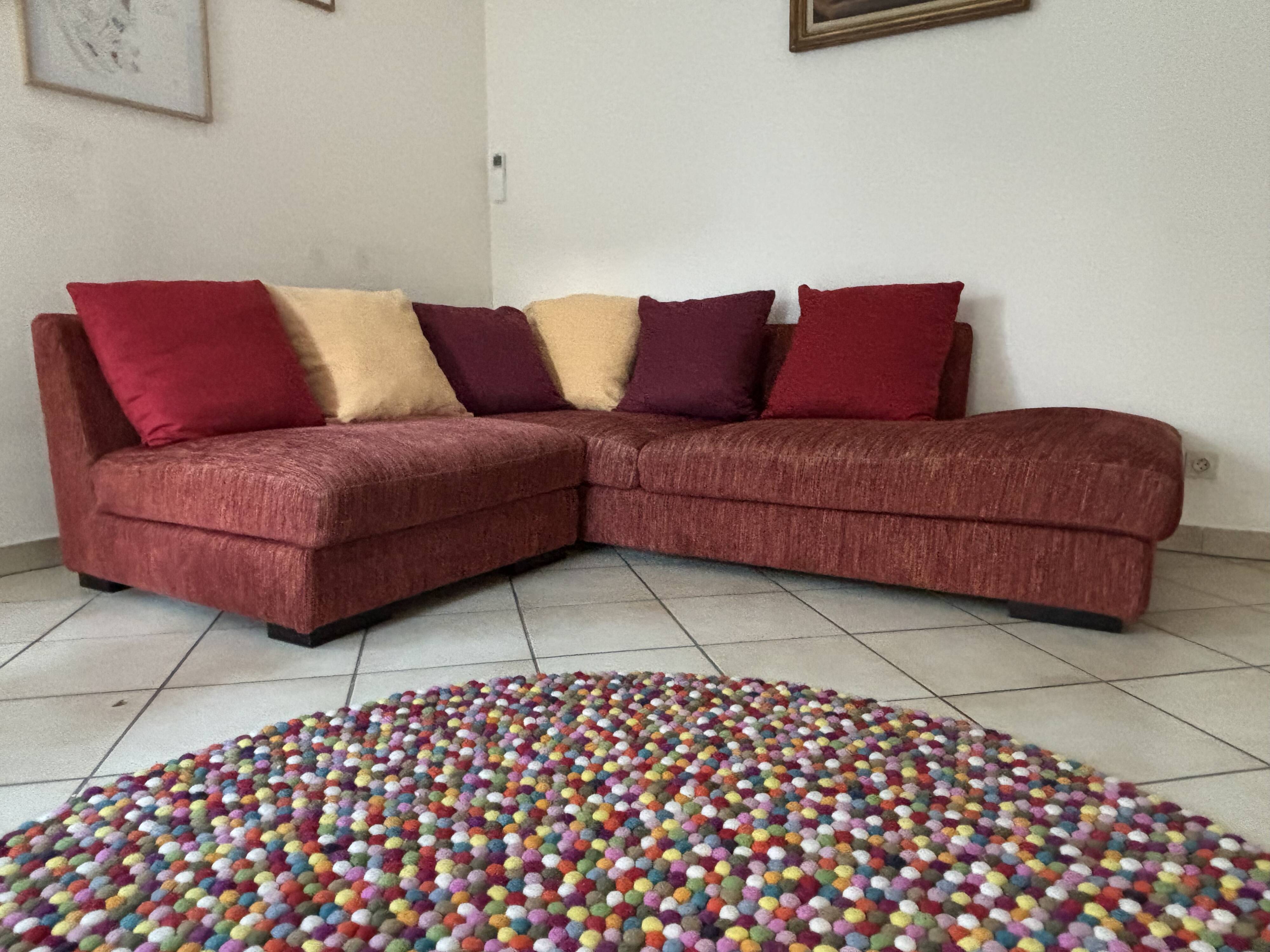 Four-seater meridian with a chaise longue roche bobois model khanami.