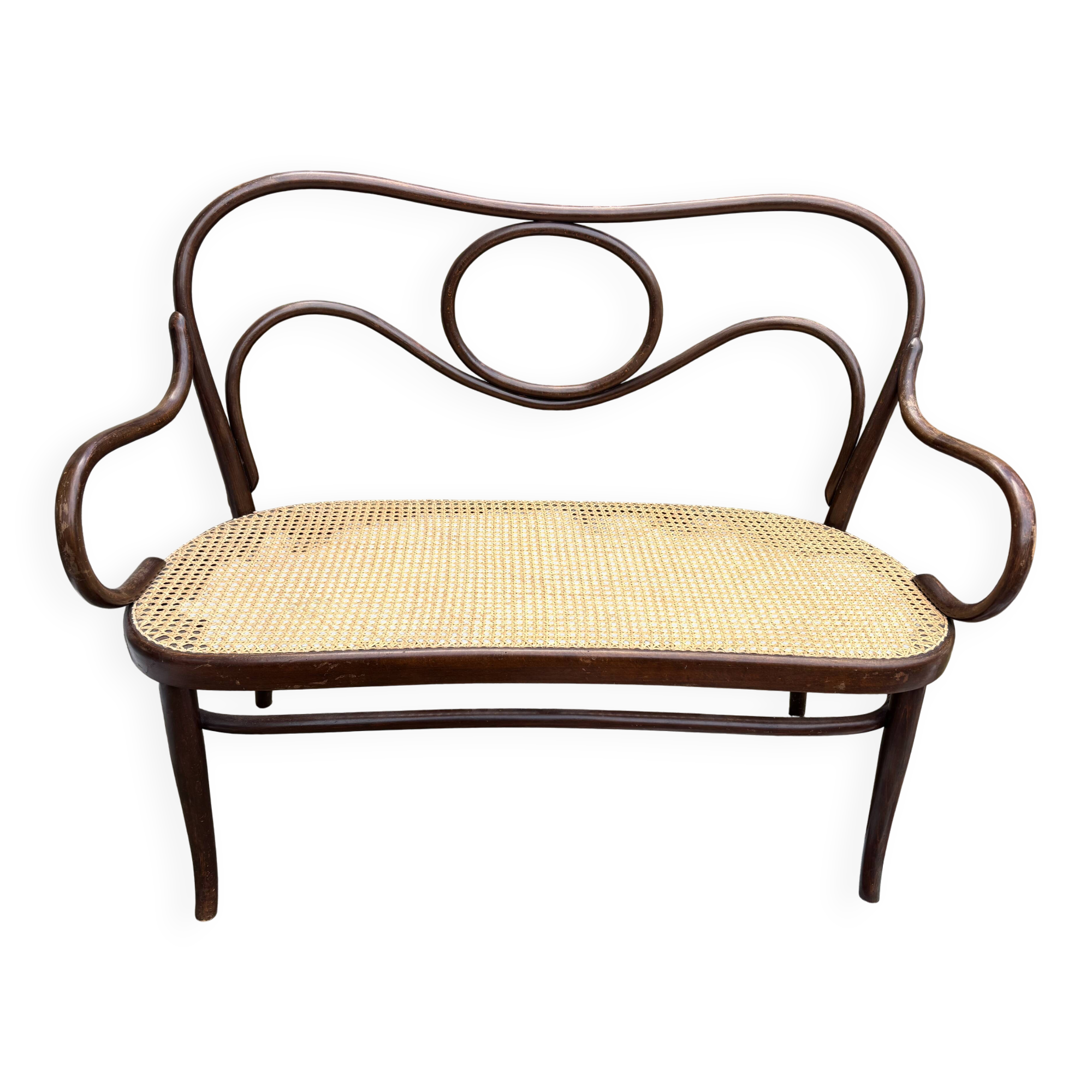 Antique Thonet bench in bent wood and caning, signed.
