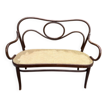 Banquette Thonet ancienne en bois courbé et cannage, signée