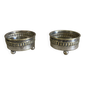 Silver metal cups from the early 20th century decorated with a frieze
