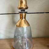 Glass and gilded bottle