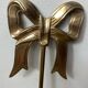 Solid brass bow and ribbon wall candle holder