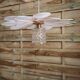 Suspension flower petals in rattan, white linen and vintage glass globe