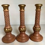 Trio of large brown and gold candlesticks