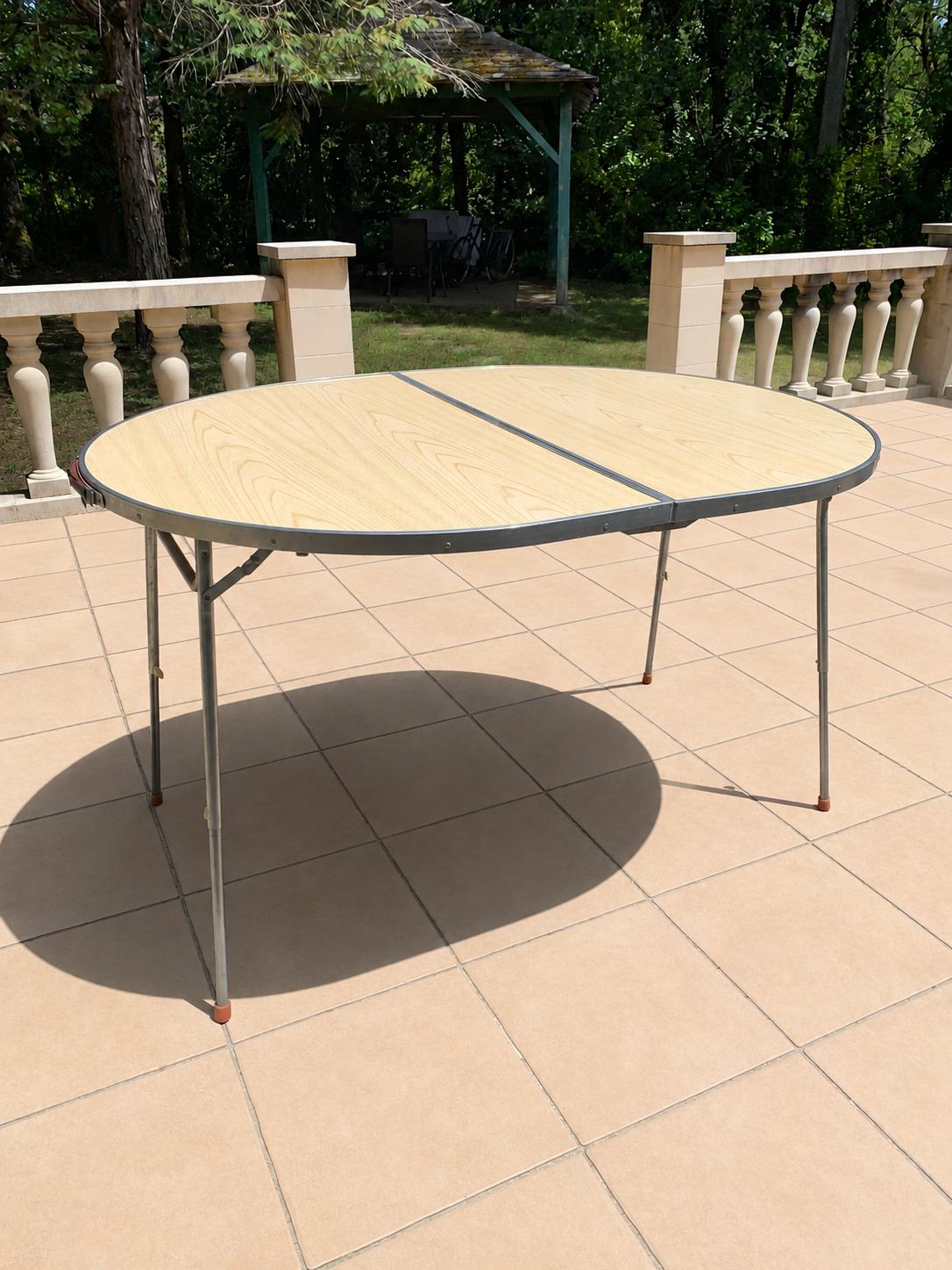 Folding oval table - height adjustable - metal and laminate - 60s/70s.