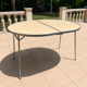 Folding oval table - height adjustable - metal and laminate - 60s/70s.