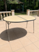 Folding oval table - height adjustable - metal and laminate - 60s/70s.