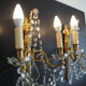 Paire d’appliques deux feux en bronze avec pampilles et guirlandes en cristal – Style Louis XV