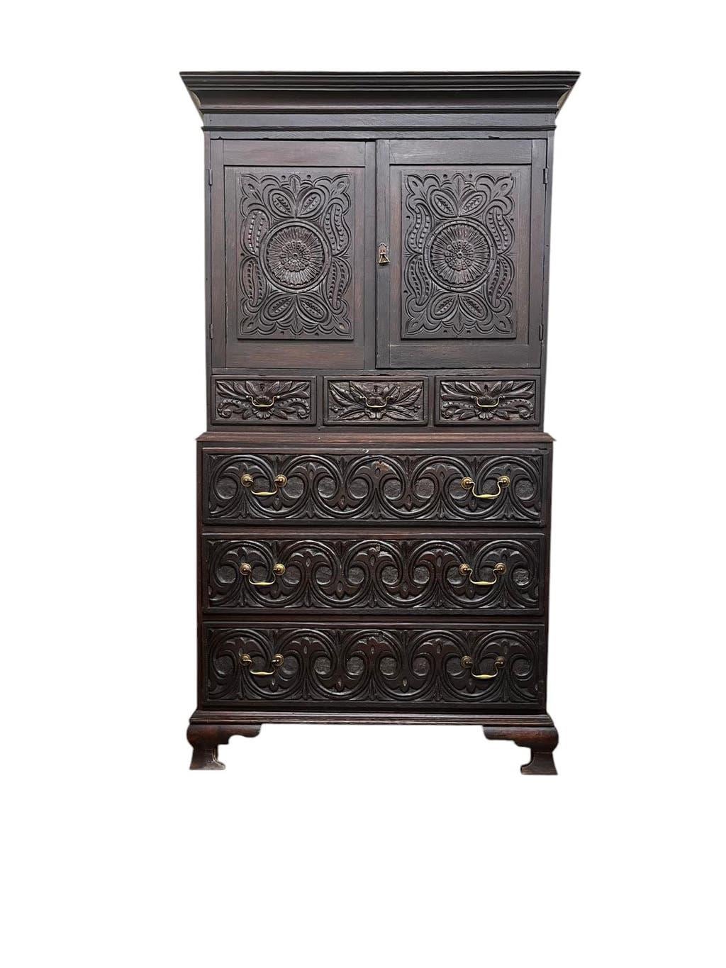 Antique tall wardrobe in dark carved wood / bohemian wardrobe
