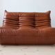 Ensemble Togo de canapé 2 places, fauteuil et pouf en cuir marron whiskey.