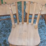 Set of 4 chairs and 1 armchair in mountain style made of oak.