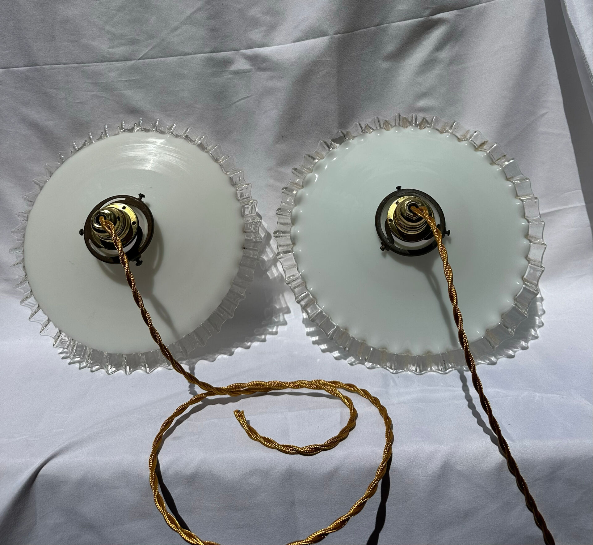 Vintage wavy opaline suspension pair with brass claw