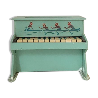 Small wooden piano, old toy from the 50s