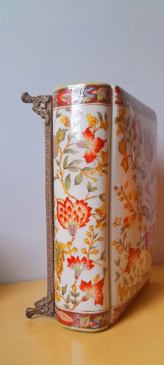 Porcelain box on claw feet