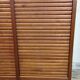 Double curtain cabinet