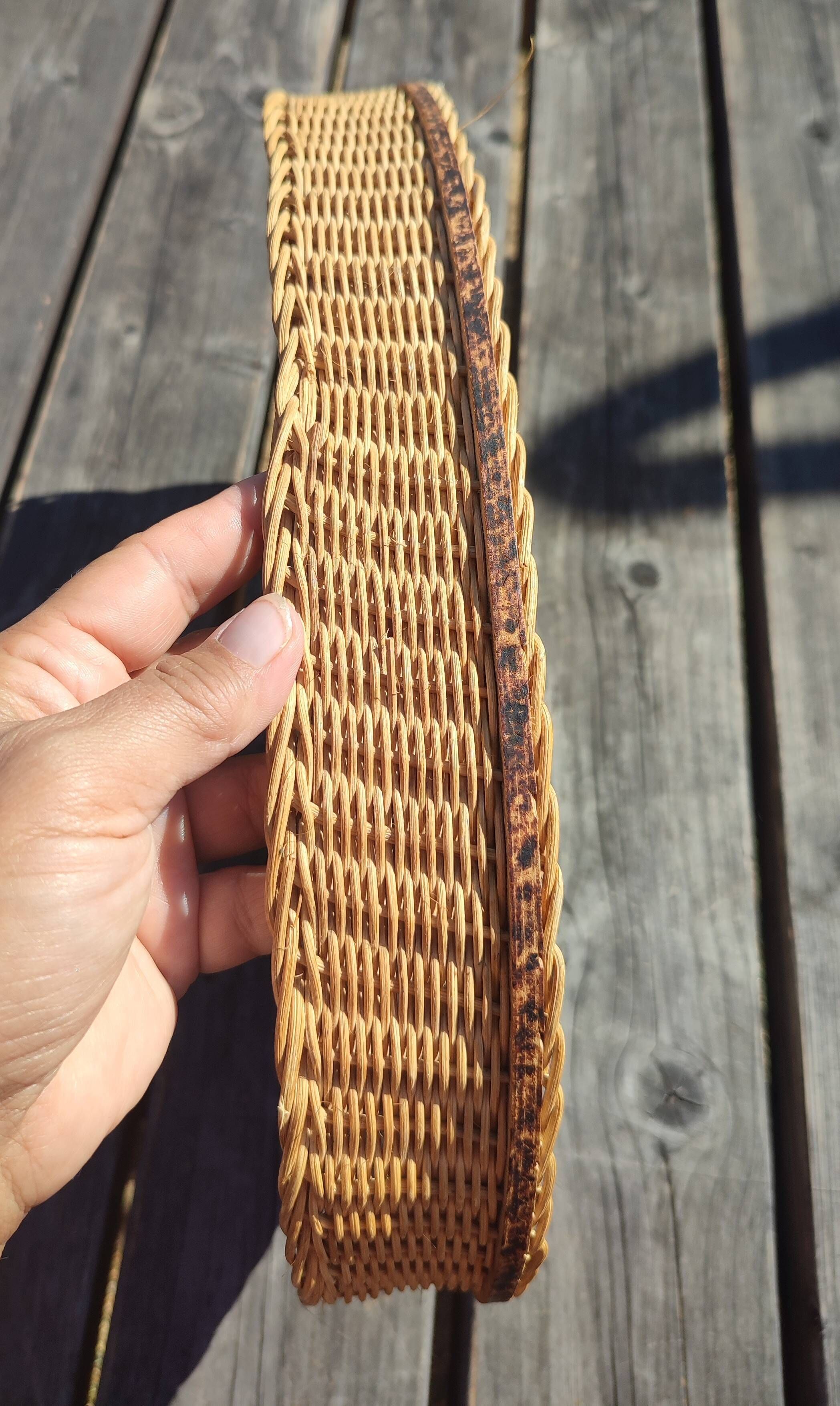 Vintage wall-mounted wicker and pyrographed wood bread basket