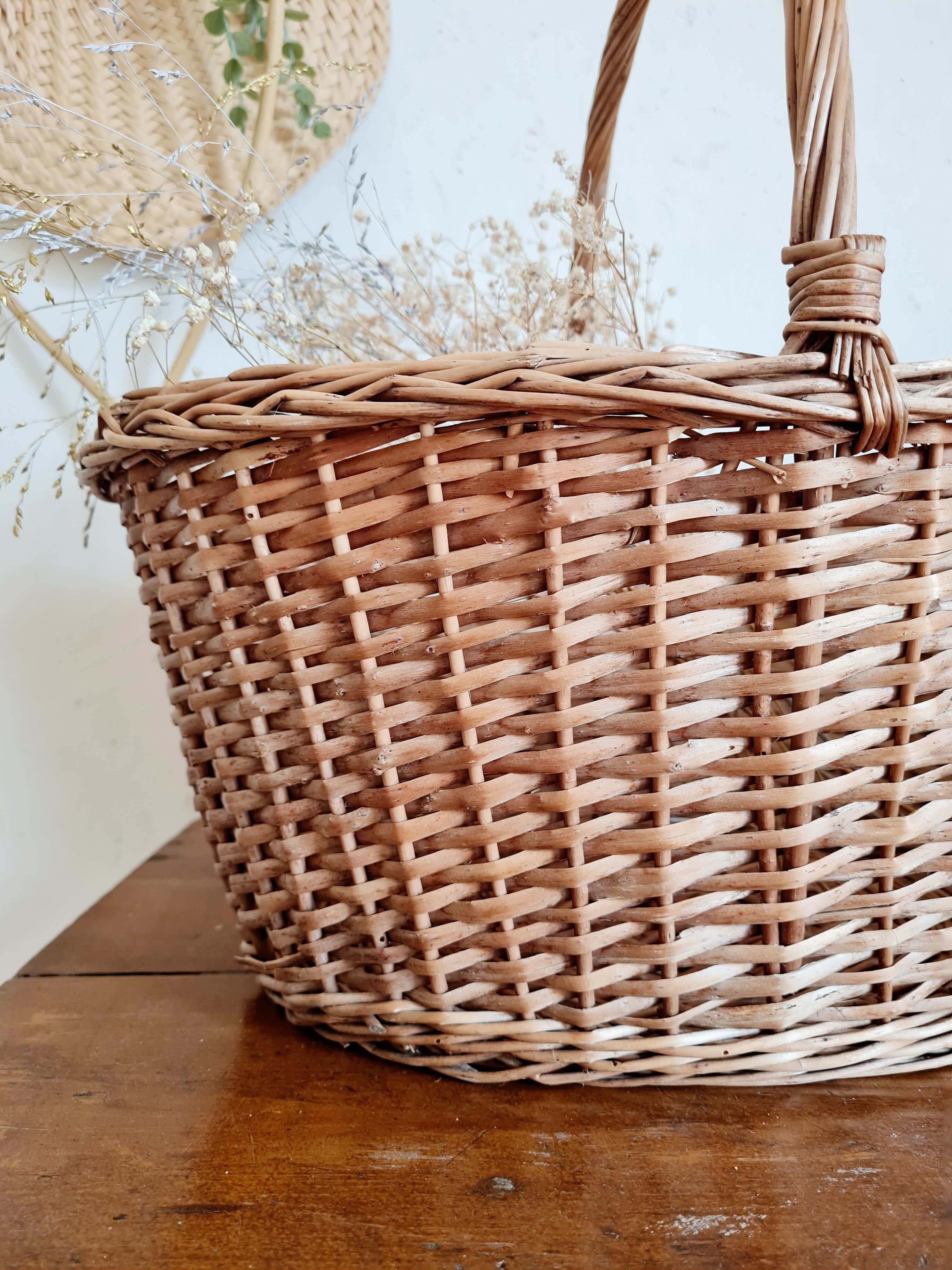 Old basket in woven rattan