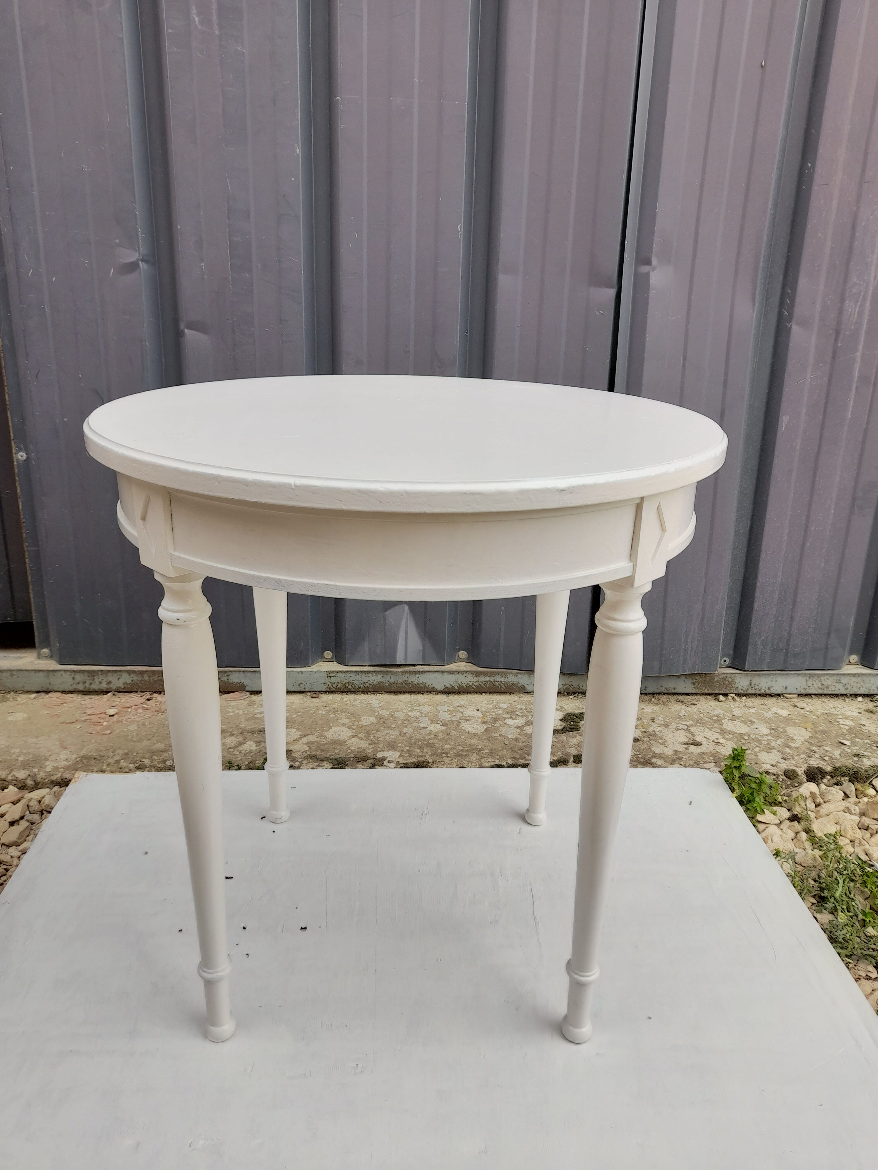 Side table in chestnut painted white