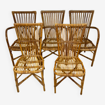 Trois fauteuils et deux chaises en rotin courbé Audoux & Minnet