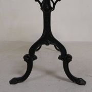 Bistro table with an oak top on a cast iron base, 1930s.