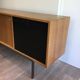 Sideboard with double sliding doors and bar on a metal base