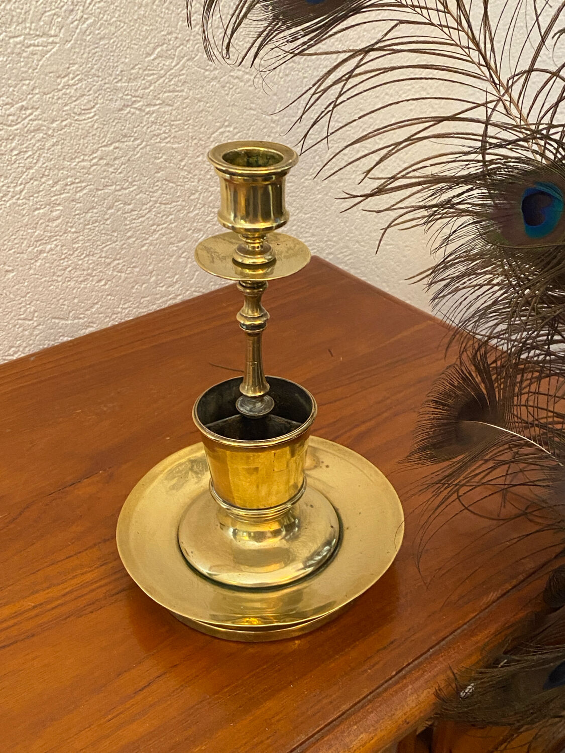 Compartmentalised brass candlestick