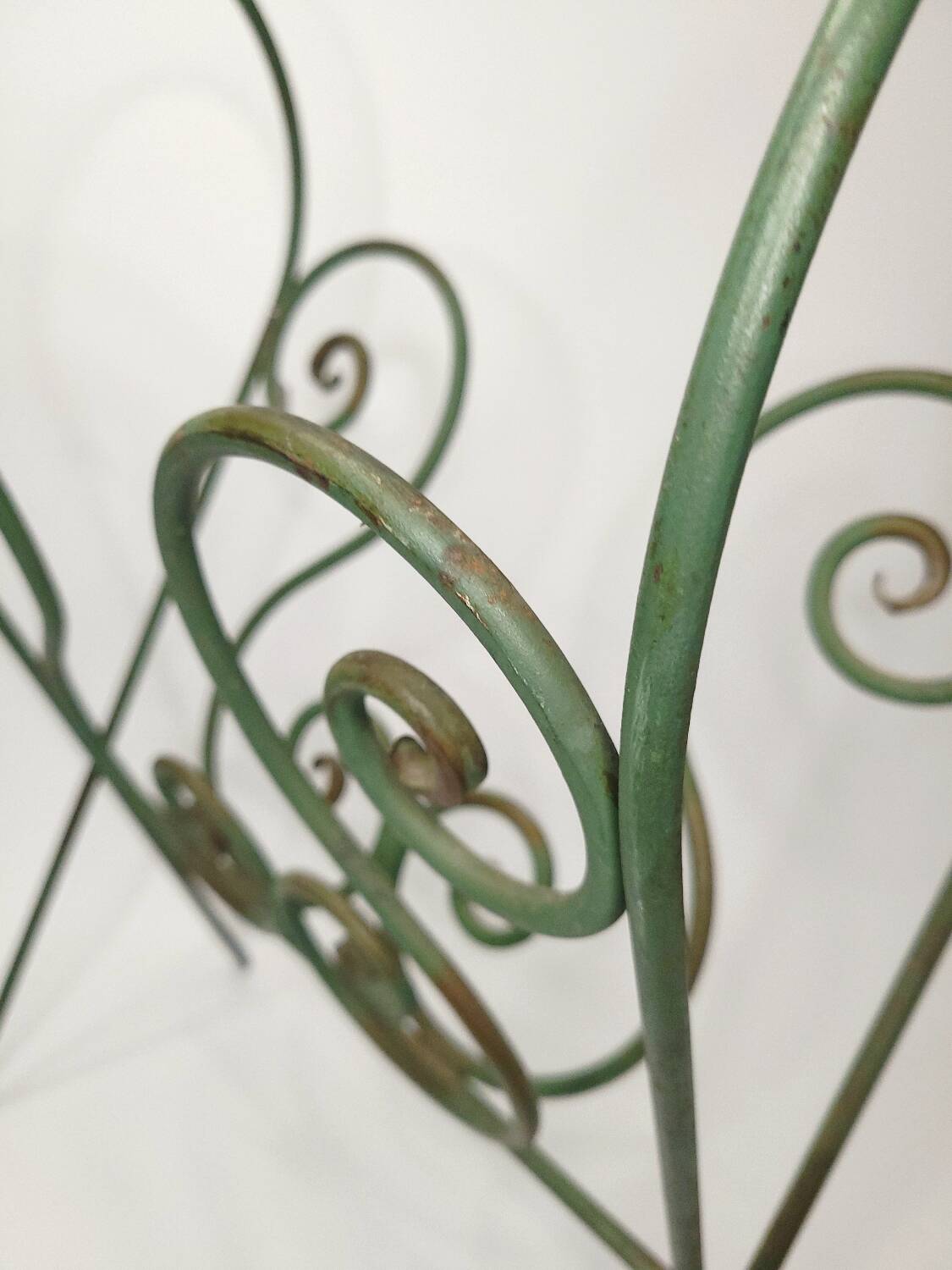 Vintage wrought iron magazine rack – handcrafted scrolls –